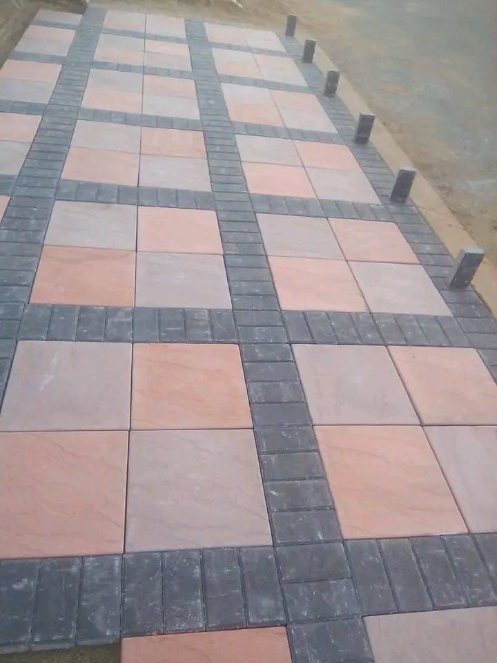 Terracotta and charcoal large square tile decorative concrete driveway